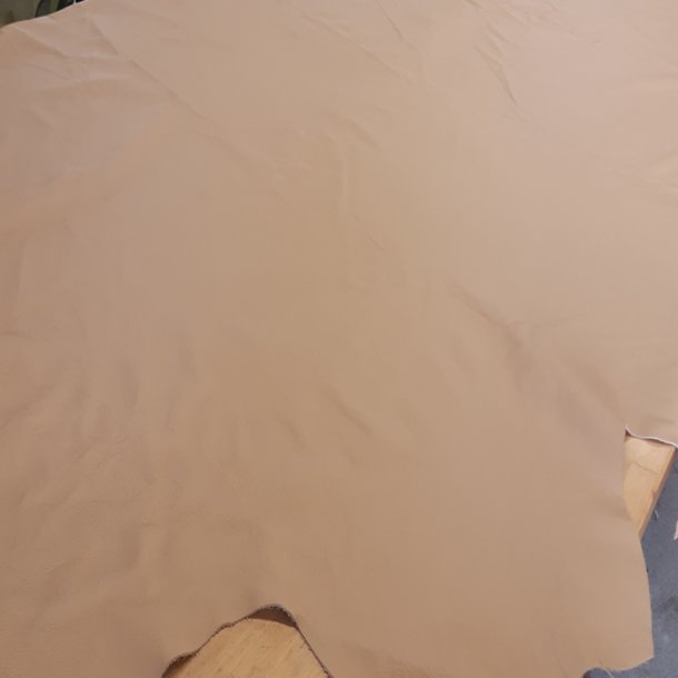 Beige hel hud 
